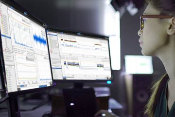 Female analyzing data on computer
