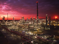 refinery at sunset