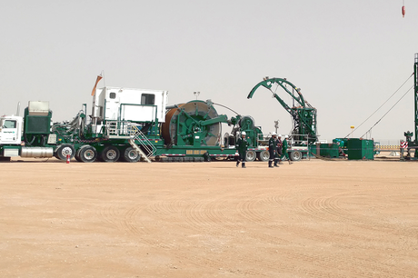 Photo of a coiled tubing truck in the field.