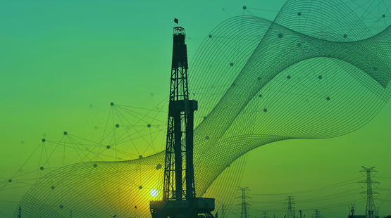 Photo of a land oil rig with data graphic overlay.