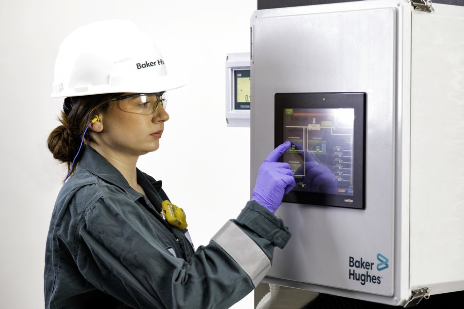 Baker Hughes engineer working with a remote controller – product chemicals