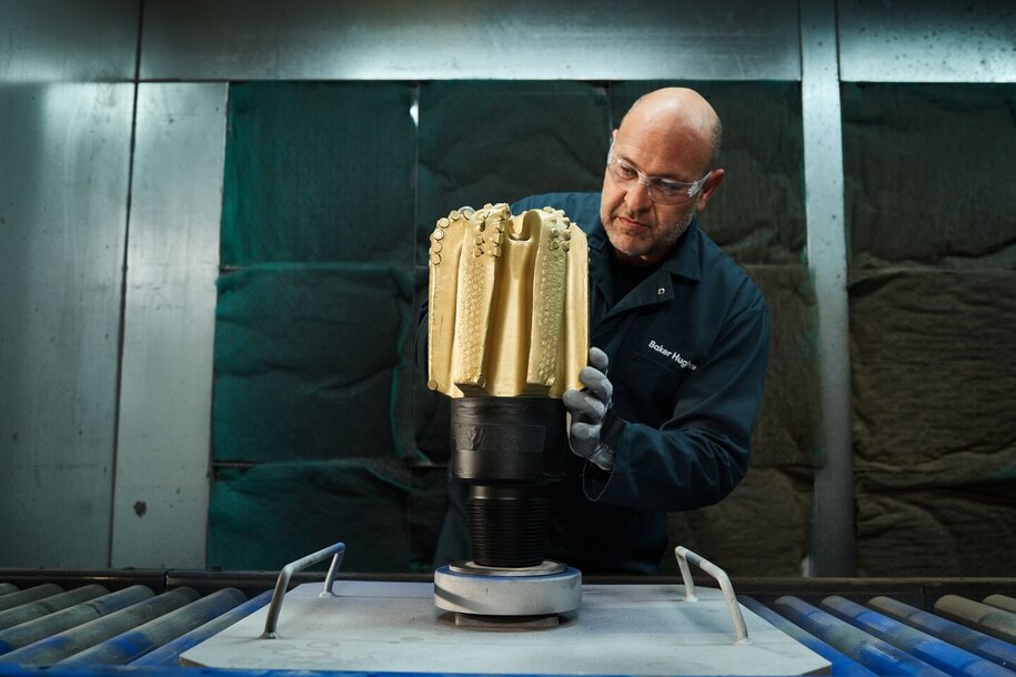 Baker Hughes Employee works on a Barbarian drill bit