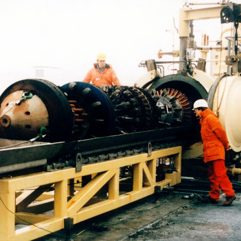 Plant with technicians working