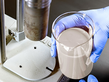 Photo of some DELTAFLOW drill-in fluids in a beaker.