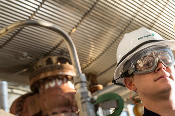 Photo of a Baker Hughes chemical engineer in the field.