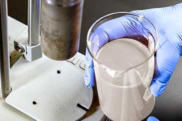 Photo of some DELTAFLOW drill-in fluids in a beaker.