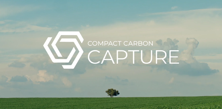 an image of the 3C logo with a background of green land and pink cloudy skies