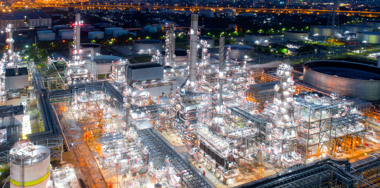 Aerial view of twilight of oil refinery ,Shot from drone of Oil refinery and Petrochemical plant at dusk , Bangkok, Thailand