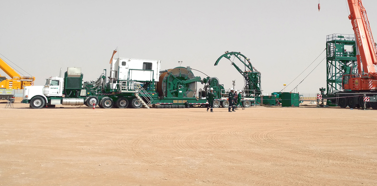 Photo of a coiled tubing truck in the field.
