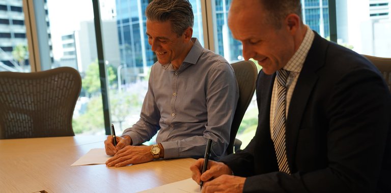 Woodside Daniel Kalms, Executive Vice President of Technical Services and Chief Technology Officer and Graham Gilles, Baker Hughes Vice President for Asia Pacific sign MoU