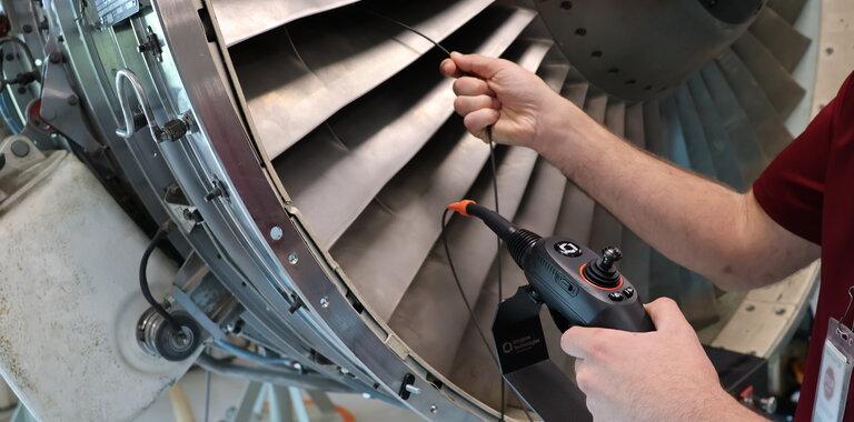 2.2mm 4-way articulation probe used with MViQ video borescope to inspect an engine.
