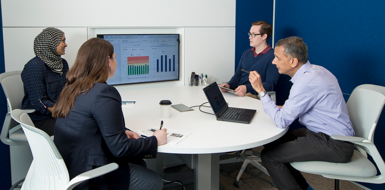People collaborating in a conference room.