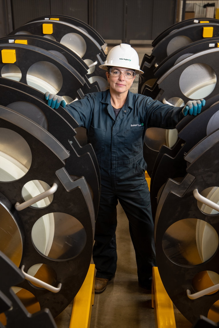 Women standing with white hard hat