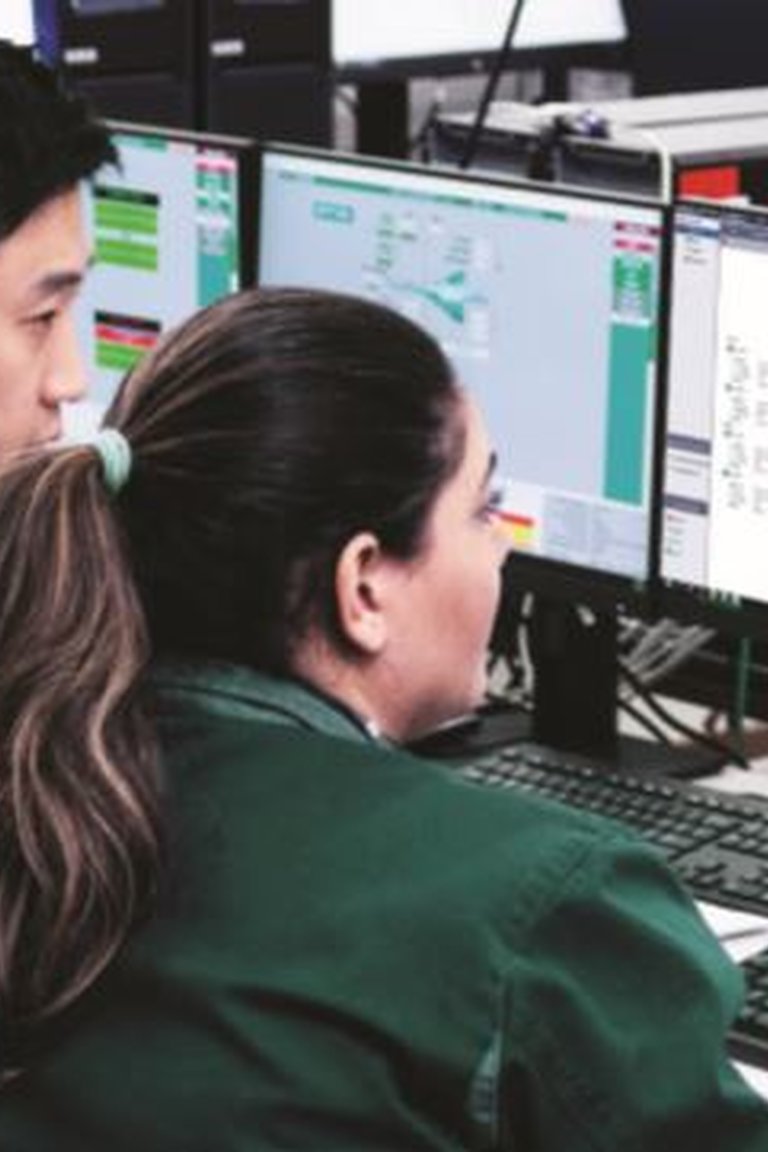 Workers with HMI Screen