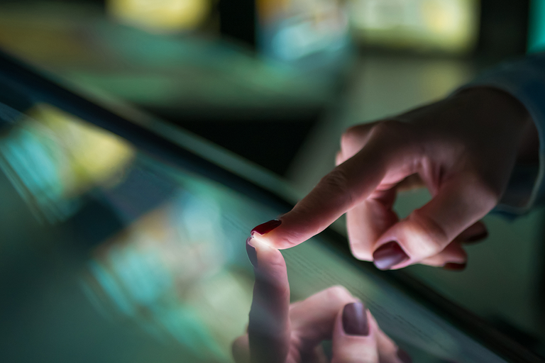 Index finger touching touchscreen