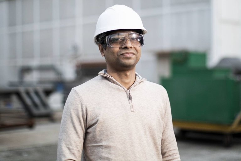 Man in hard hat and safety glasses
