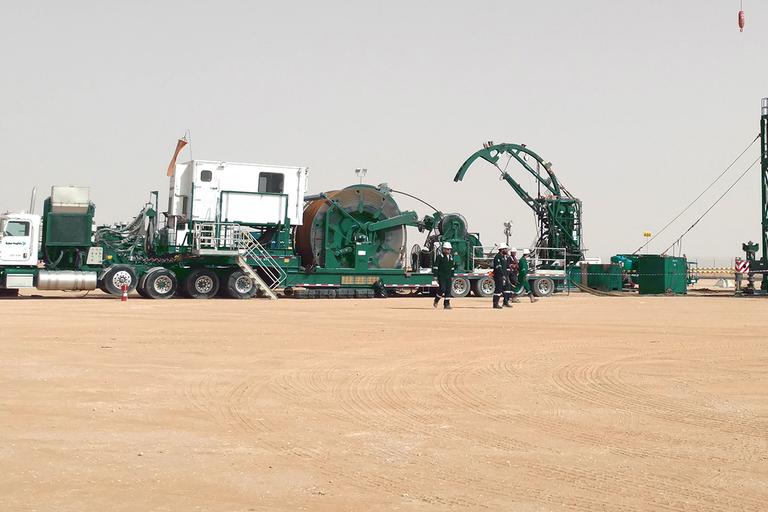 Photo of a coiled tubing truck in the field.