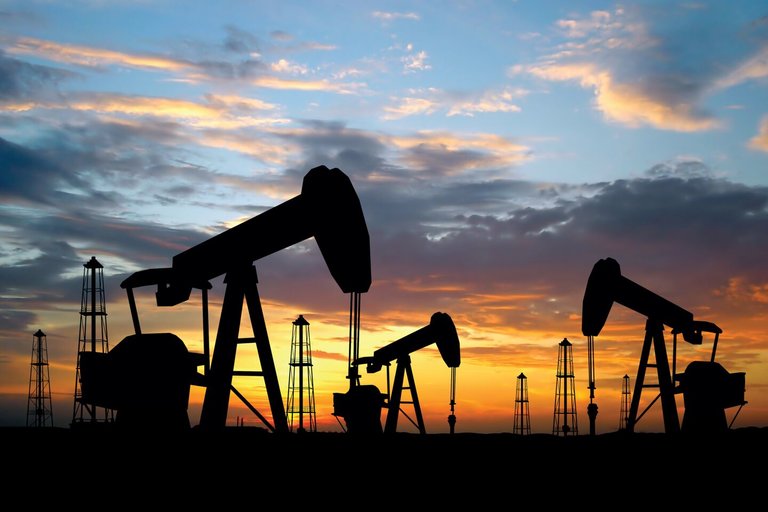 Photo of some pump jacks.